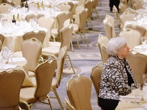 Fed Reserve Chair, Janet Yellen sits at the annual White House Correspondent's Dinner waiting for the gala to begin. 